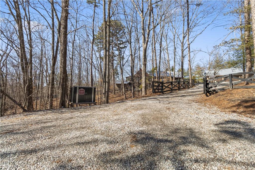 308 Hugh Stowers Road Dawsonville, GA 30534 - Photo 78 of 81 a view of outdoor space with deck and trees