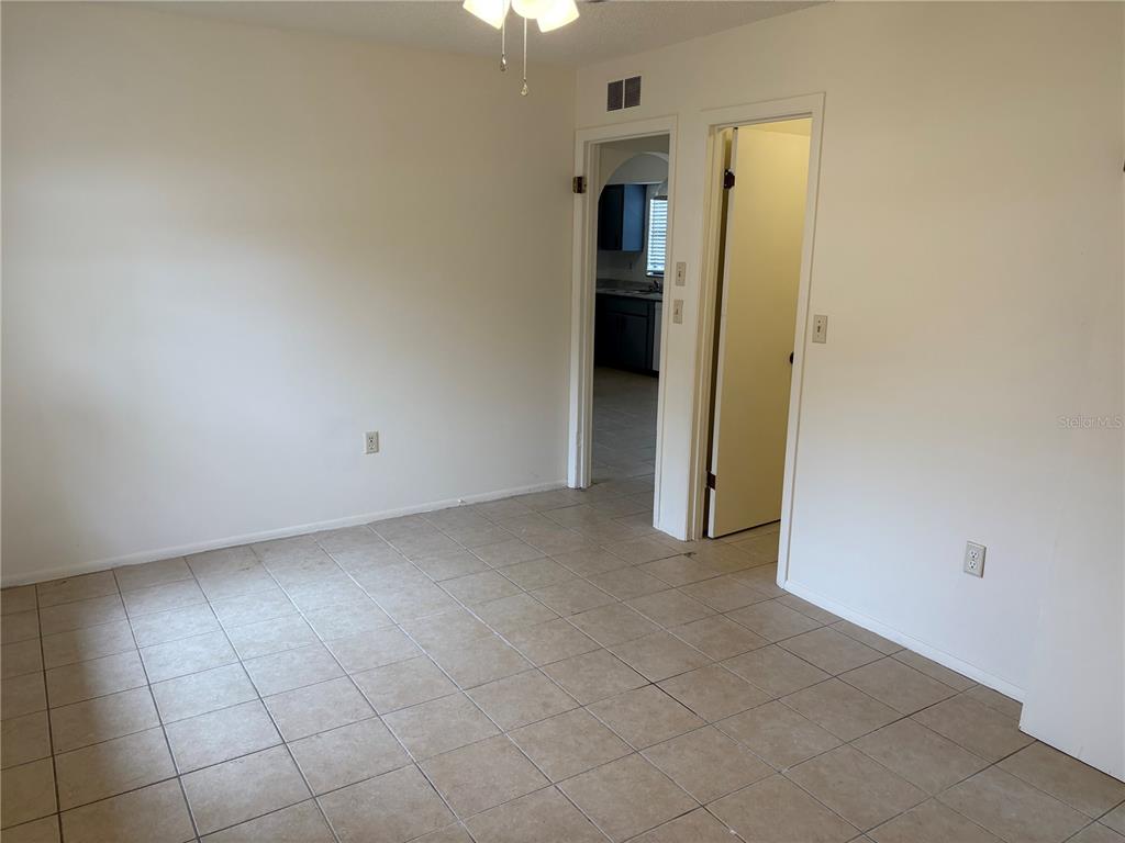 10305 Bannister Street Spring Hill, FL 34608 - Photo 15 of 24 an empty room with a bathroom