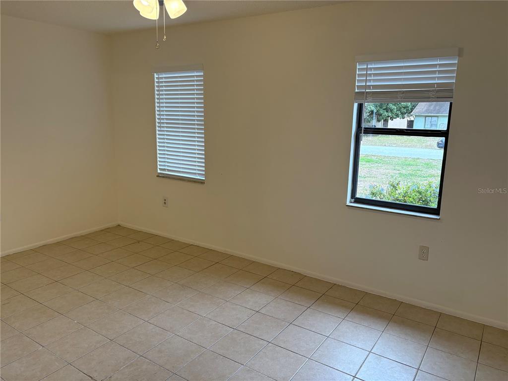 10305 Bannister Street Spring Hill, FL 34608 - Photo 17 of 24 an empty room with a window