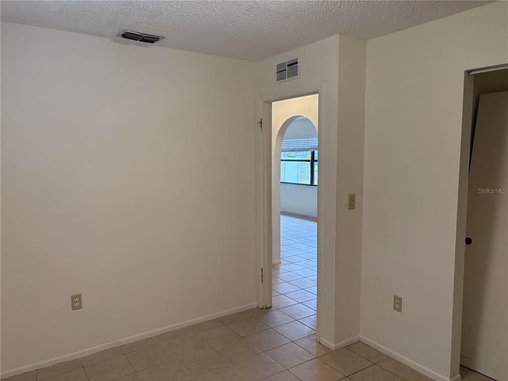 10305 Bannister Street Spring Hill, FL 34608 - Photo 21 of 24 a view of a room with door