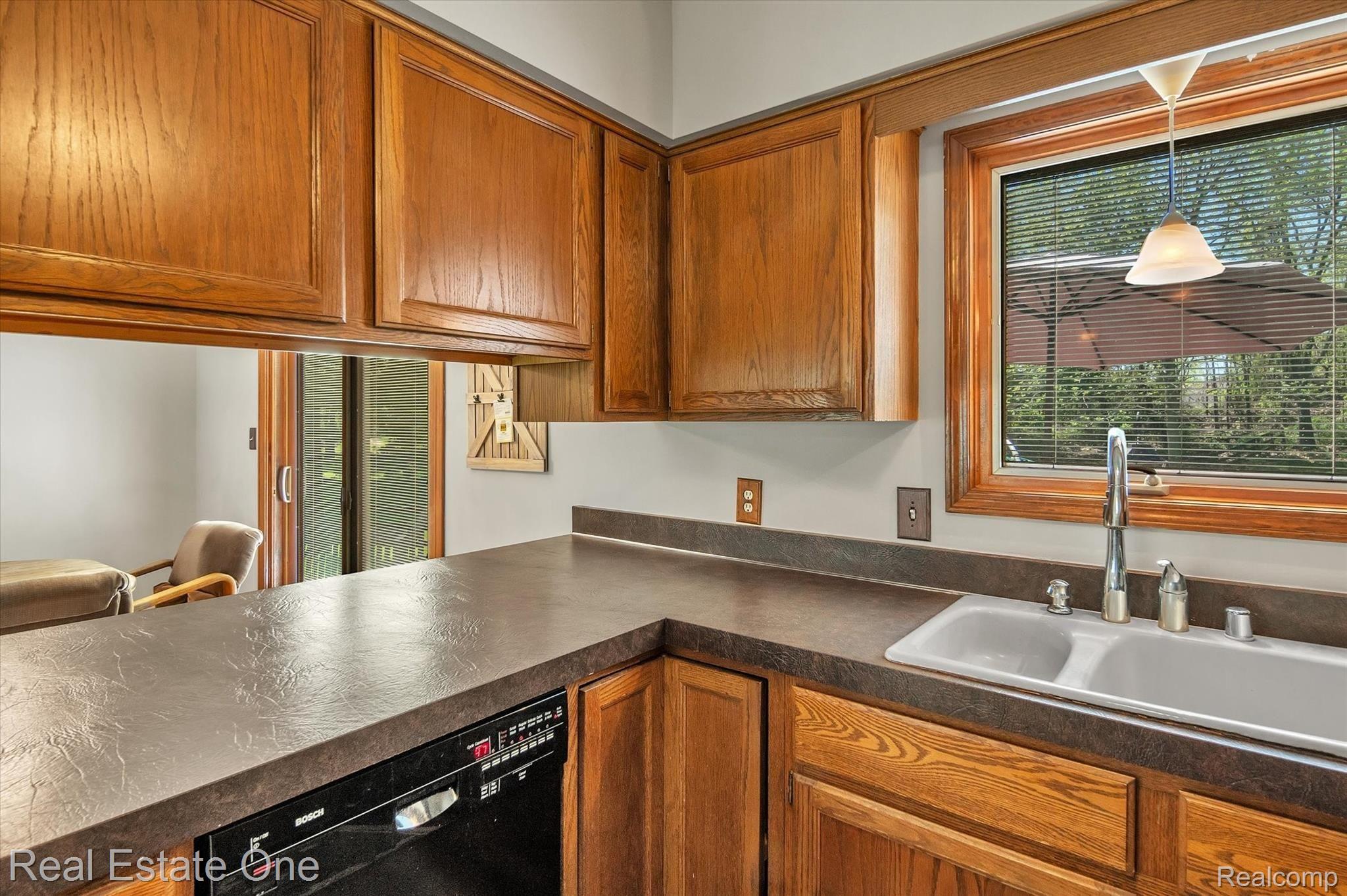 8816 Hilton Road Brighton, MI 48114 - Photo 12 of 45 Generous Cabinet Storage