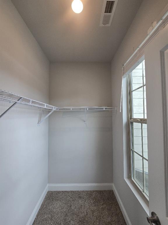6190 Ripple Way, Unit 85 Atlanta, GA 30349 - Photo 14 of 16 a view of an empty room with a window