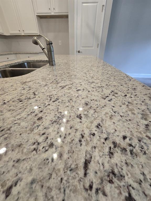 6190 Ripple Way, Unit 85 Atlanta, GA 30349 - Photo 4 of 16 a kitchen with a sink