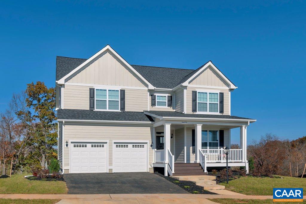 121 Paynes Mill Road Charlottesville, VA 22902 - Photo 1 of 8 a front view of a house with a yard