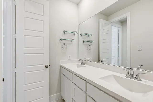 a view of a balcony with wooden floor and seating space