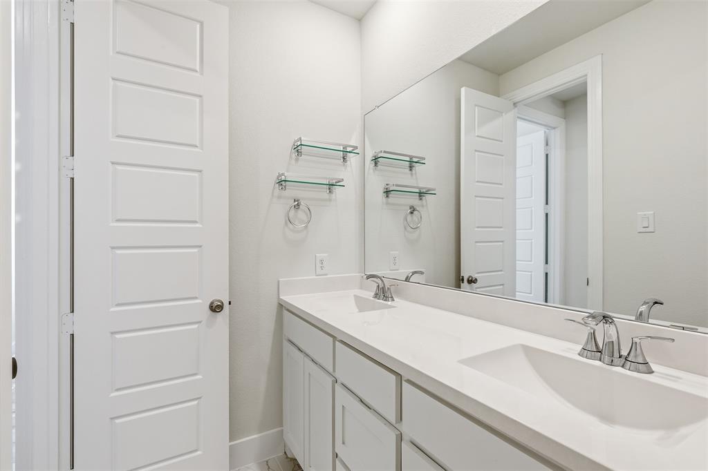 4400 Rocky Rdg Trail Little Elm, TX 75068 - Photo 24 of 40 Full bath featuring double vanity and baseboards