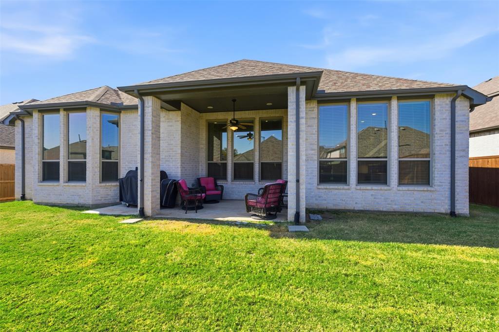4400 Rocky Rdg Trail Little Elm, TX 75068 - Photo 27 of 40 front view of a house with a yard