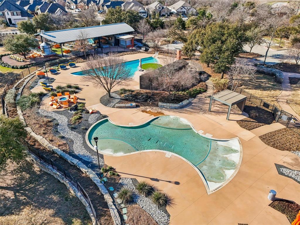 4400 Rocky Rdg Trail Little Elm, TX 75068 - Photo 36 of 40 an aerial view of a swimming pool patio and outdoor seating