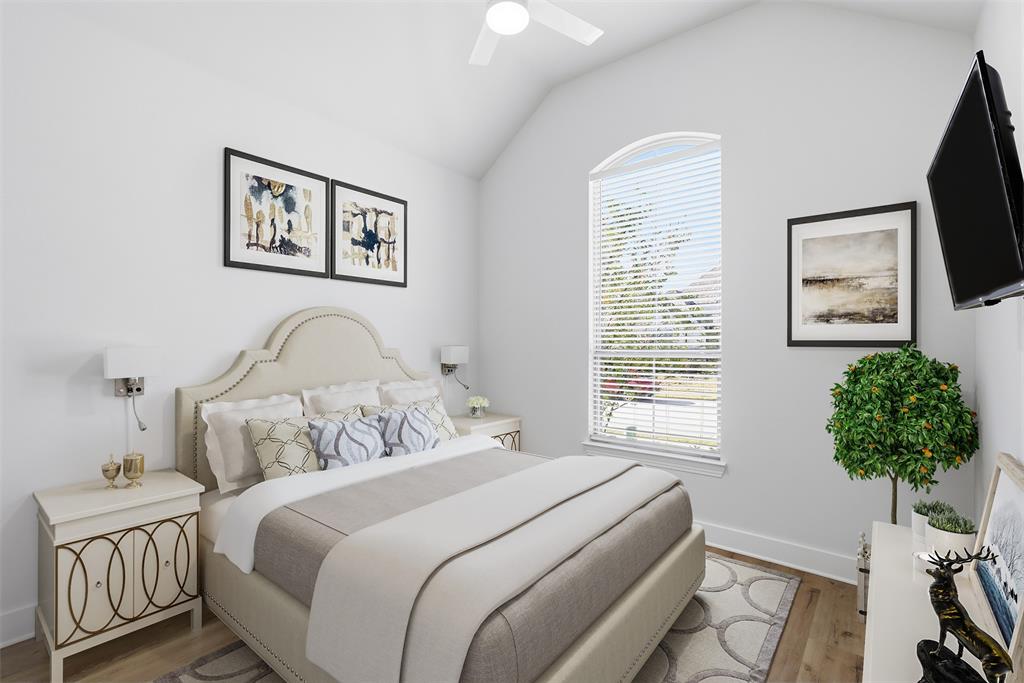 4400 Rocky Rdg Trail Little Elm, TX 75068 - Photo 10 of 40 a bedroom with bed and a flat screen tv