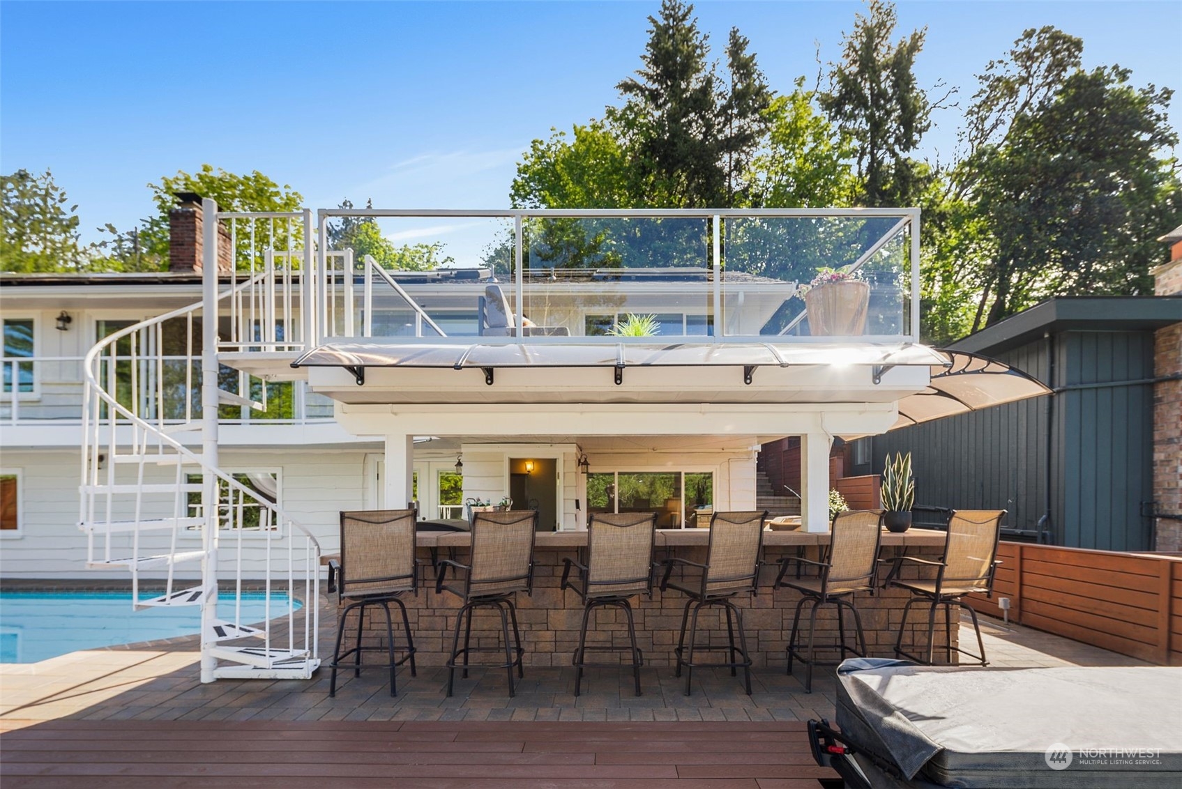 8423 Tillicum Road Southwest Seattle, WA 98136 - Photo 26 of 35 a roof deck with table and chairs
