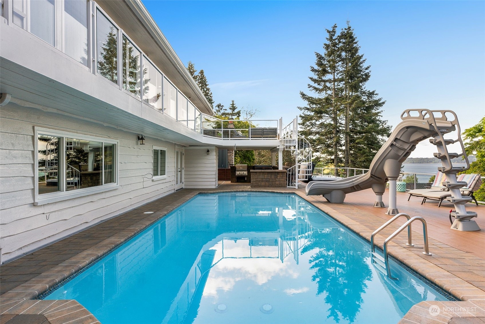 8423 Tillicum Road Southwest Seattle, WA 98136 - Photo 29 of 35 a view of a house with swimming pool