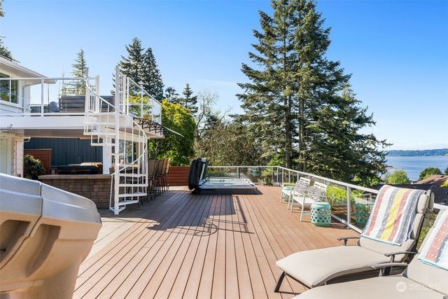 swimming pool view with a garden space