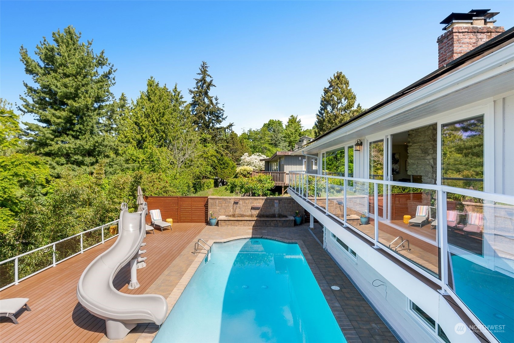 8423 Tillicum Road Southwest Seattle, WA 98136 - Photo 33 of 35 swimming pool view with a garden space