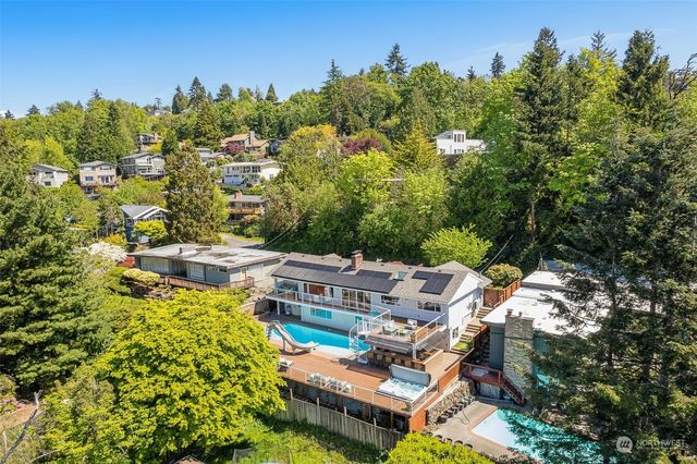 a view of a balcony with chairs