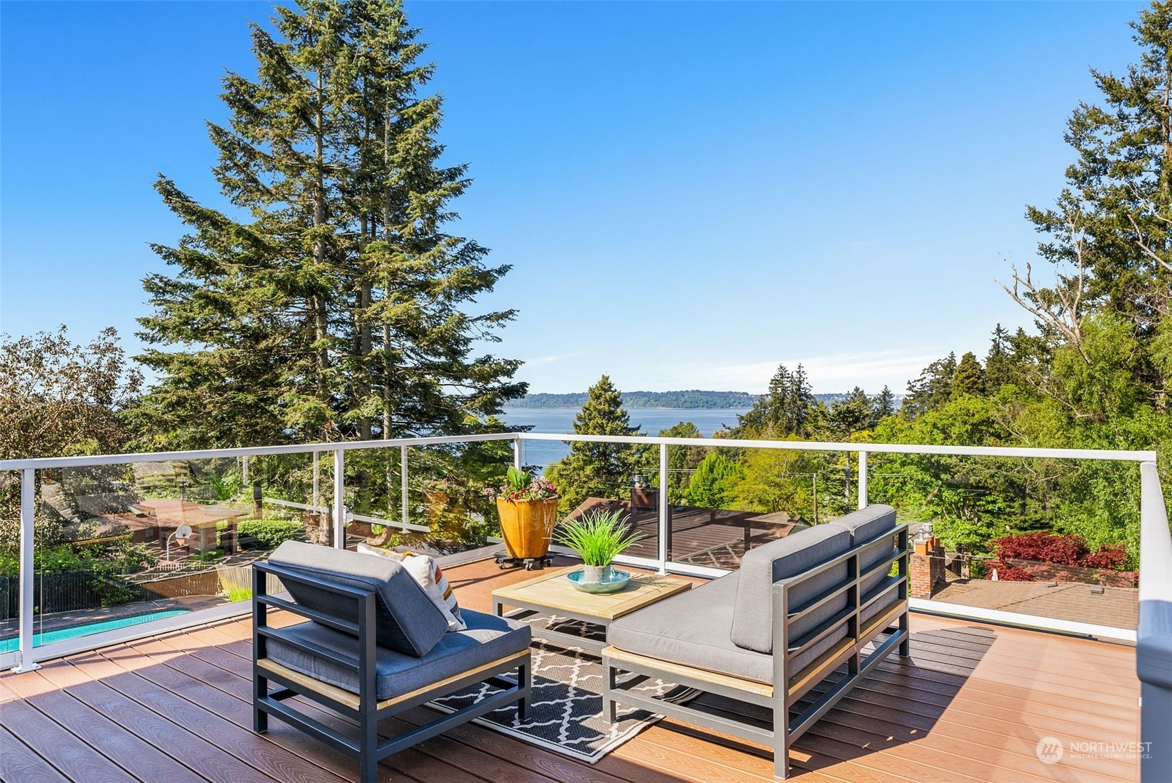 8423 Tillicum Road Southwest Seattle, WA 98136 - Photo 6 of 35 a roof deck with couches and wooden floor