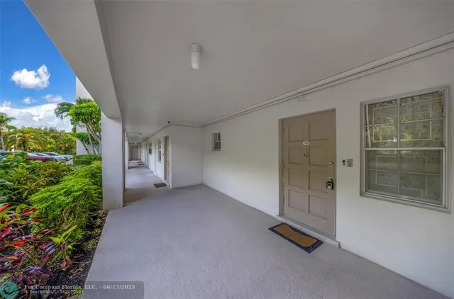 a kitchen with cabinets stainless steel appliances and counter space