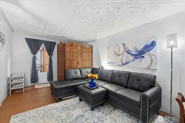 a living room with furniture and a couch