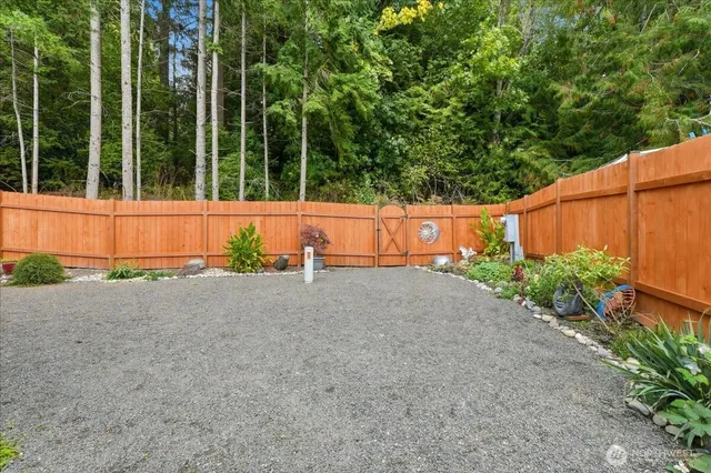 a view of backyard and garden