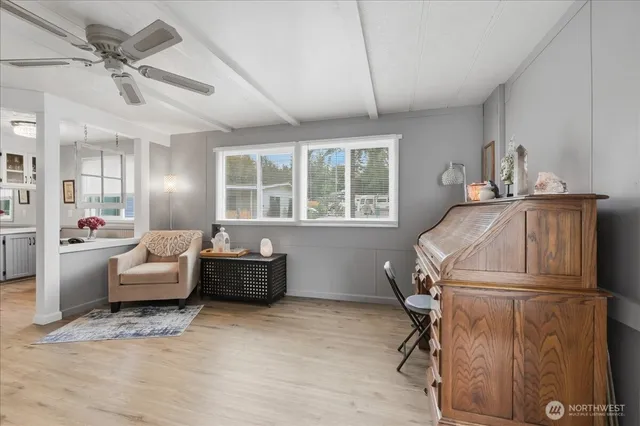 a living room with furniture and a window