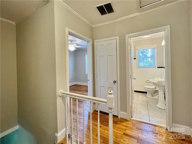 view of hall way with mirror