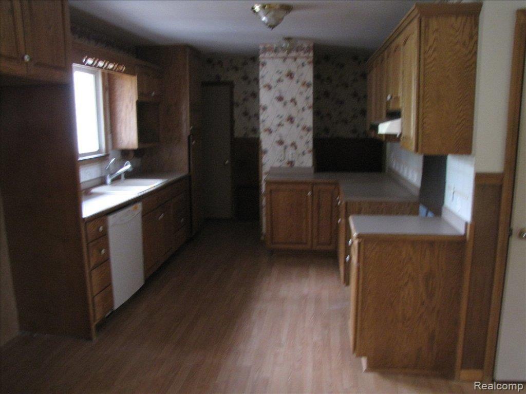 5101 Warner Road Fowlerville, MI 48836 - Photo 10 of 21 garage side