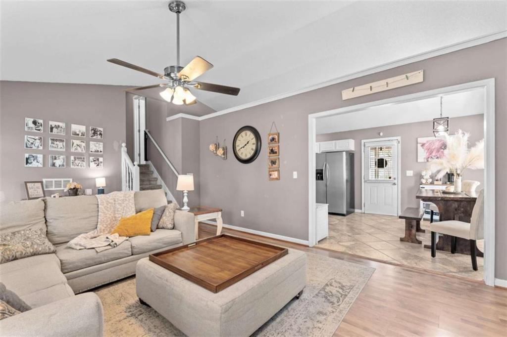 105 Chrissy Drive Temple, GA 30179 - Photo 14 of 47 a living room with furniture and wooden floor