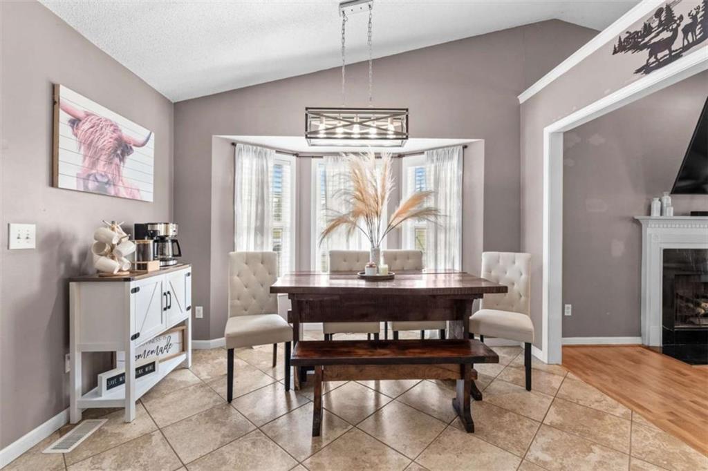 105 Chrissy Drive Temple, GA 30179 - Photo 15 of 47 a living room with furniture a table and a large window
