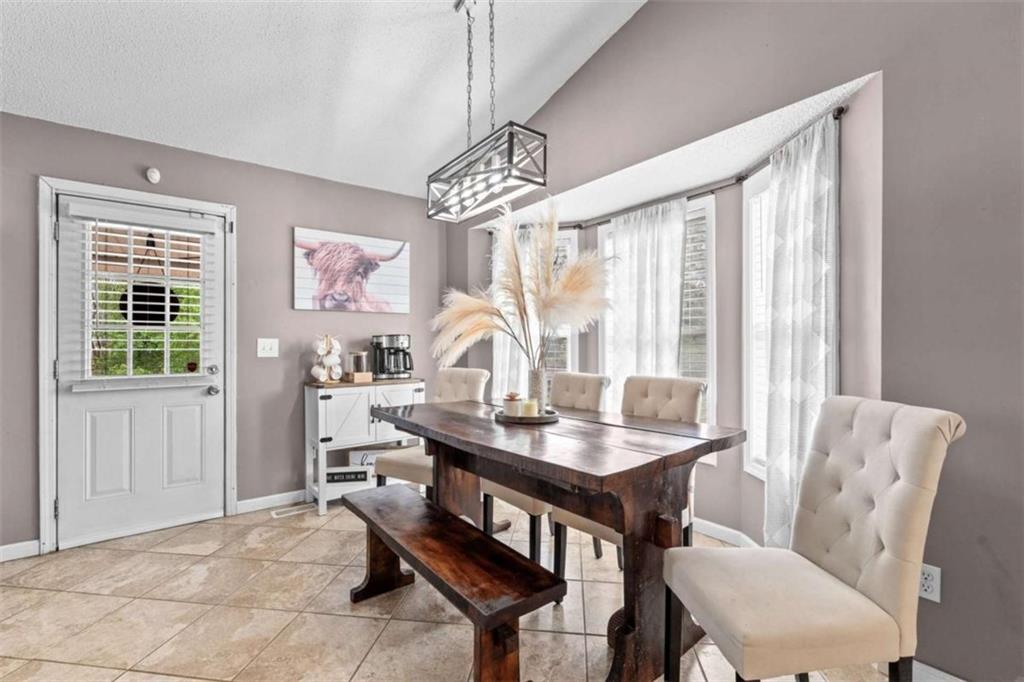 105 Chrissy Drive Temple, GA 30179 - Photo 16 of 47 a view of a dining room with furniture window and outside view