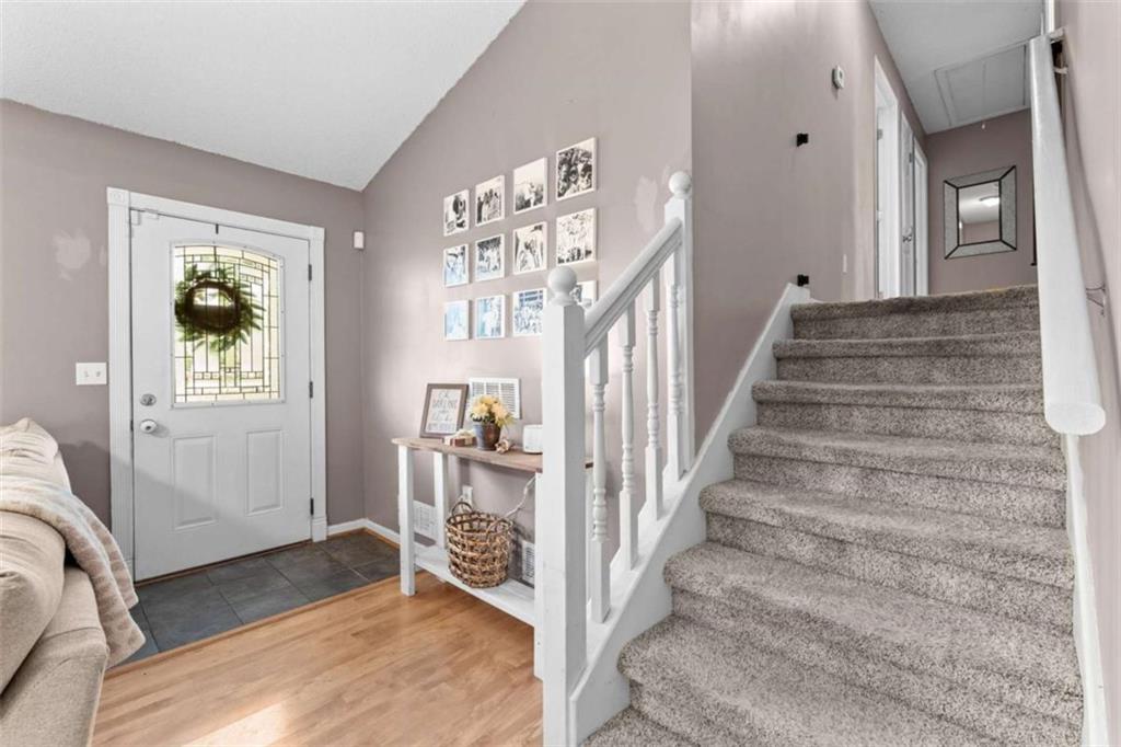105 Chrissy Drive Temple, GA 30179 - Photo 21 of 47 a view of a hallway with wooden floor and staircase