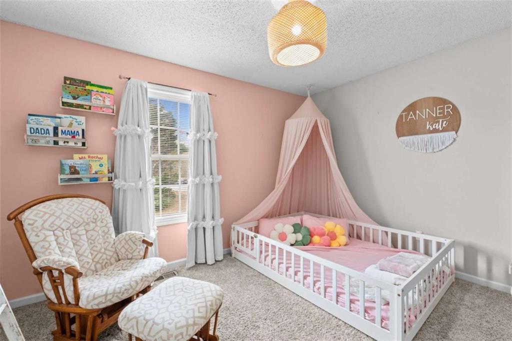 105 Chrissy Drive Temple, GA 30179 - Photo 27 of 47 a room with furniture and a table