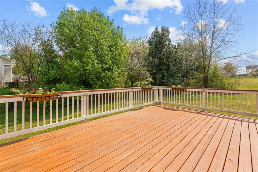 105 Chrissy Drive Temple, GA 30179 - Photo 38 of 47 a view of wooden deck and a garden