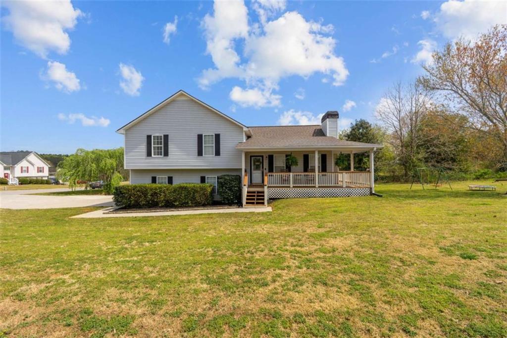 105 Chrissy Drive Temple, GA 30179 - Photo 4 of 47 a view of a house with a swimming pool