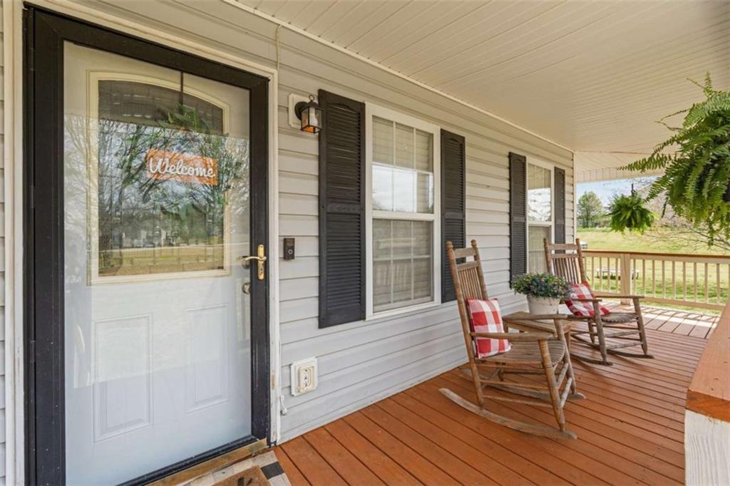 105 Chrissy Drive Temple, GA 30179 - Photo 10 of 47 a balcony with wooden floor and outdoor space