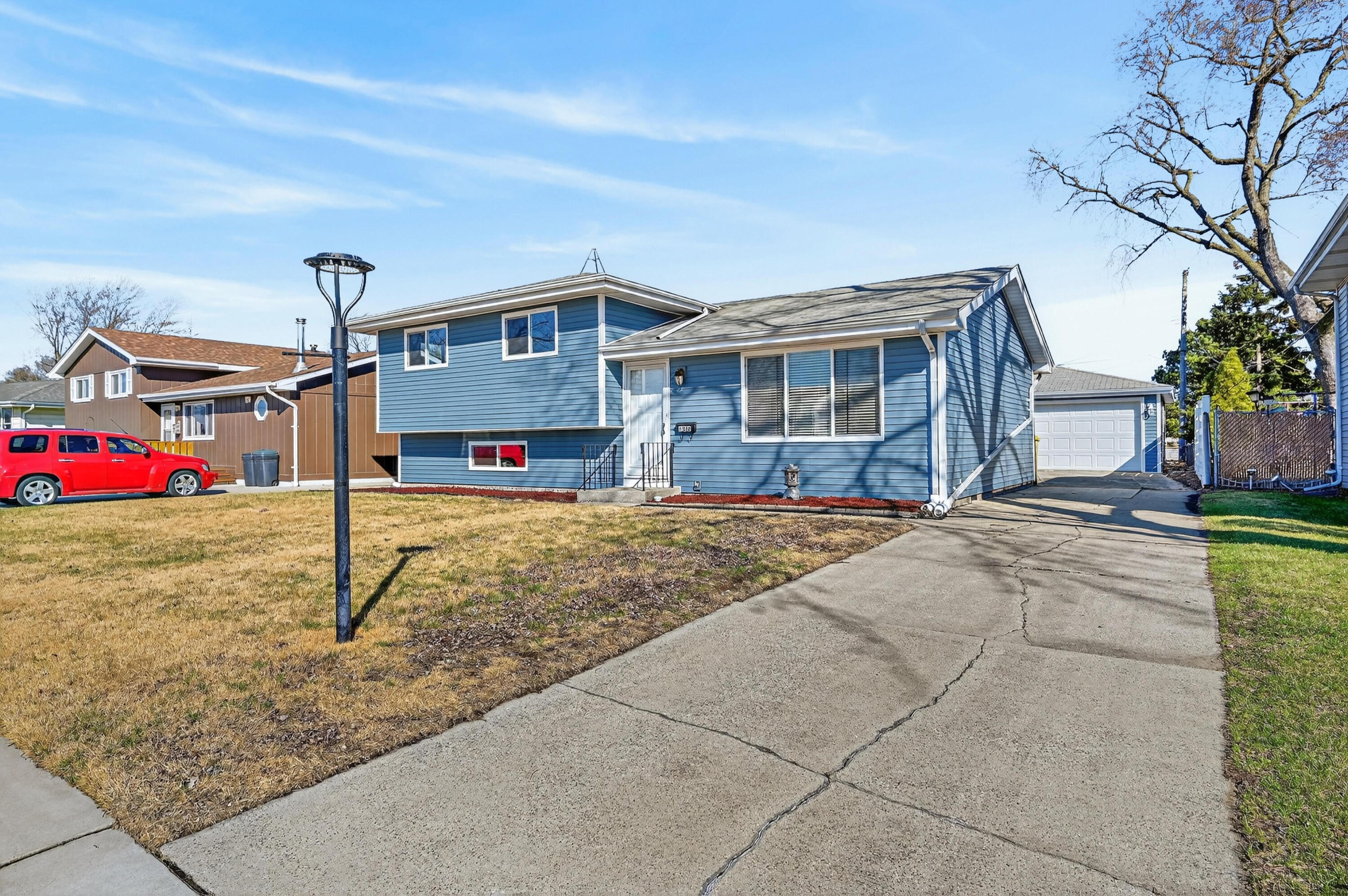 a front view of a house with street