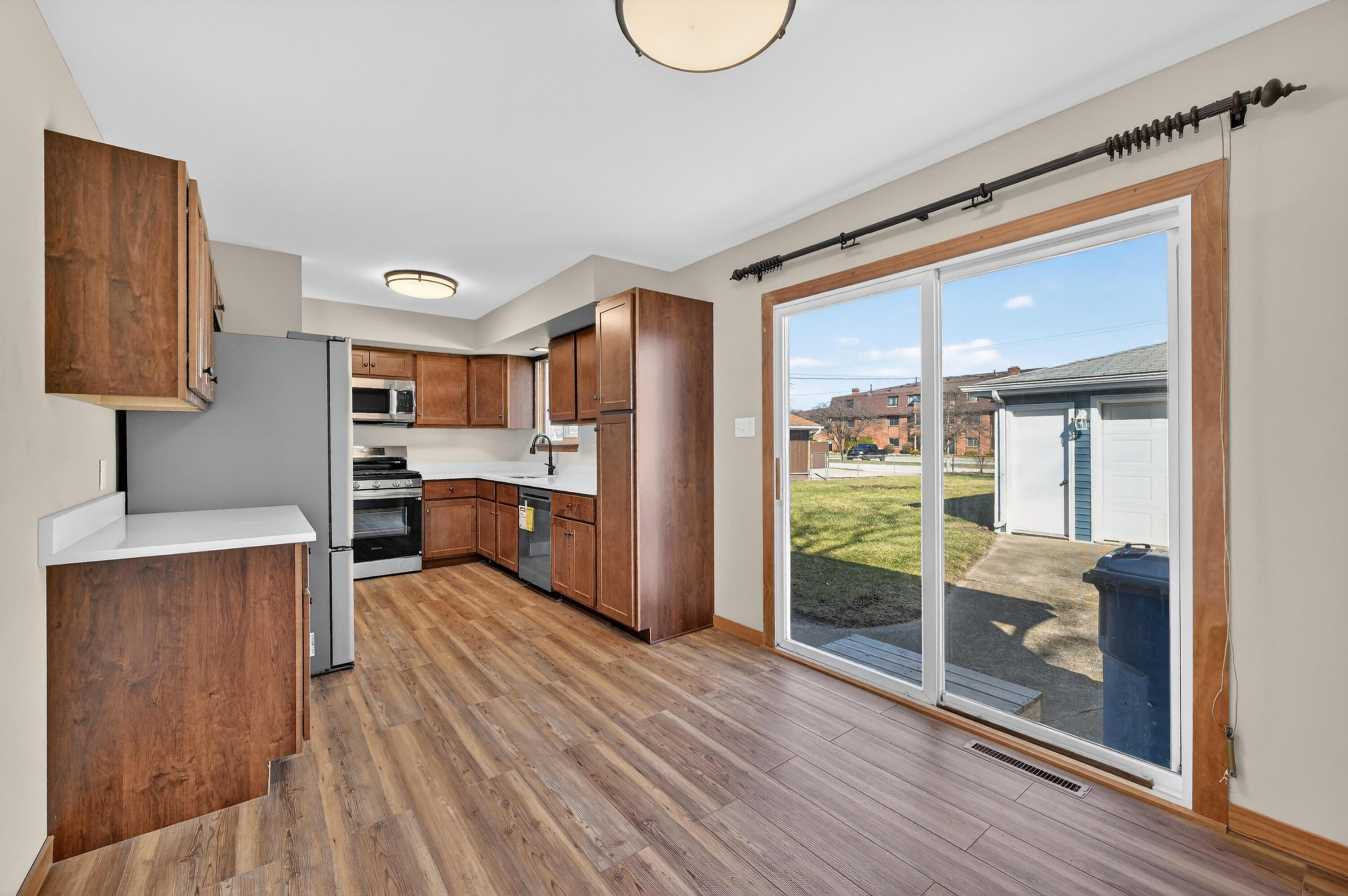 1006 West Ash Street Griffith, IN 46319 - Photo 11 of 25 a room with furniture and a wooden floor