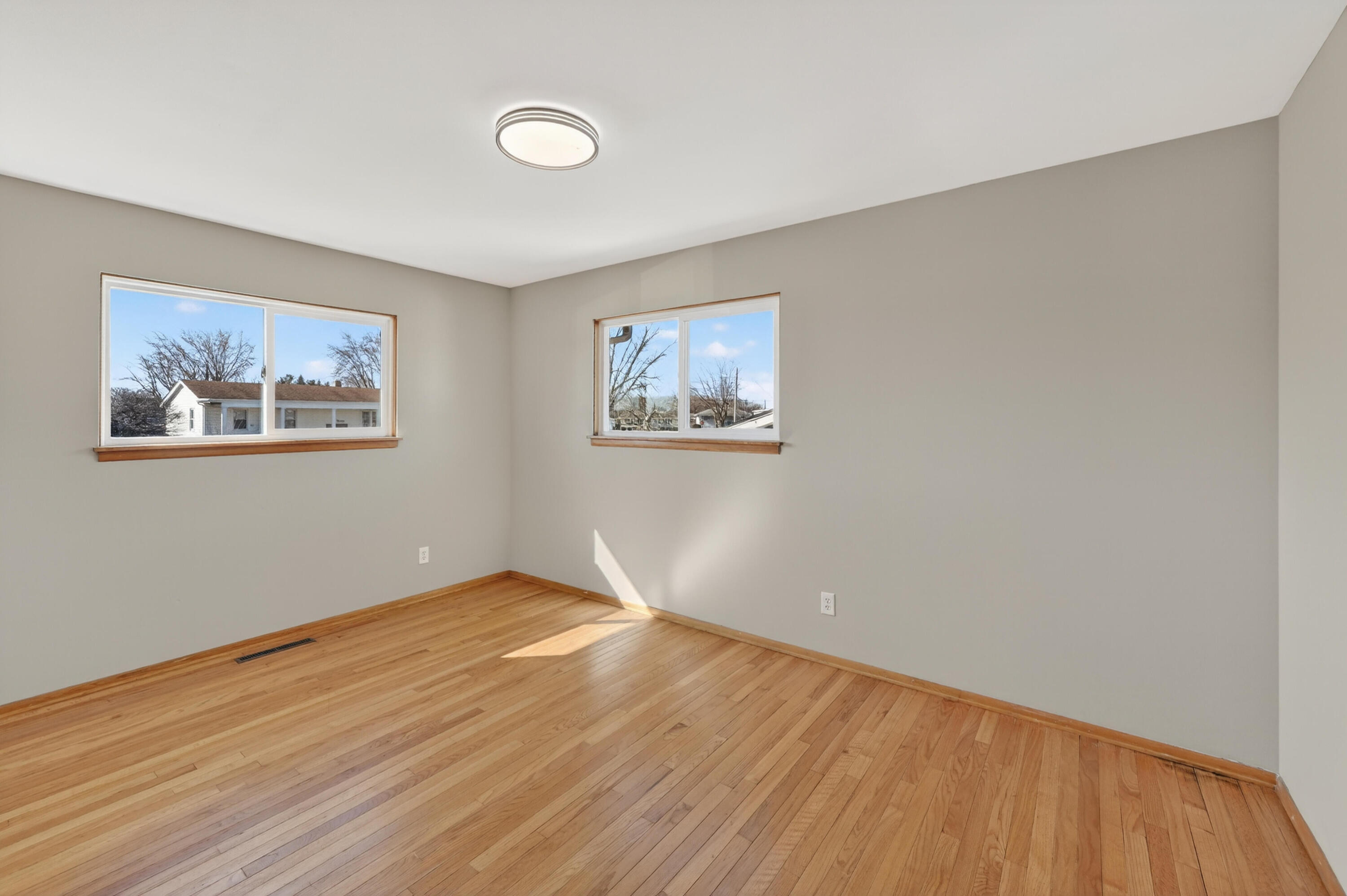 1006 West Ash Street Griffith, IN 46319 - Photo 16 of 25 a view of empty room with wooden floor
