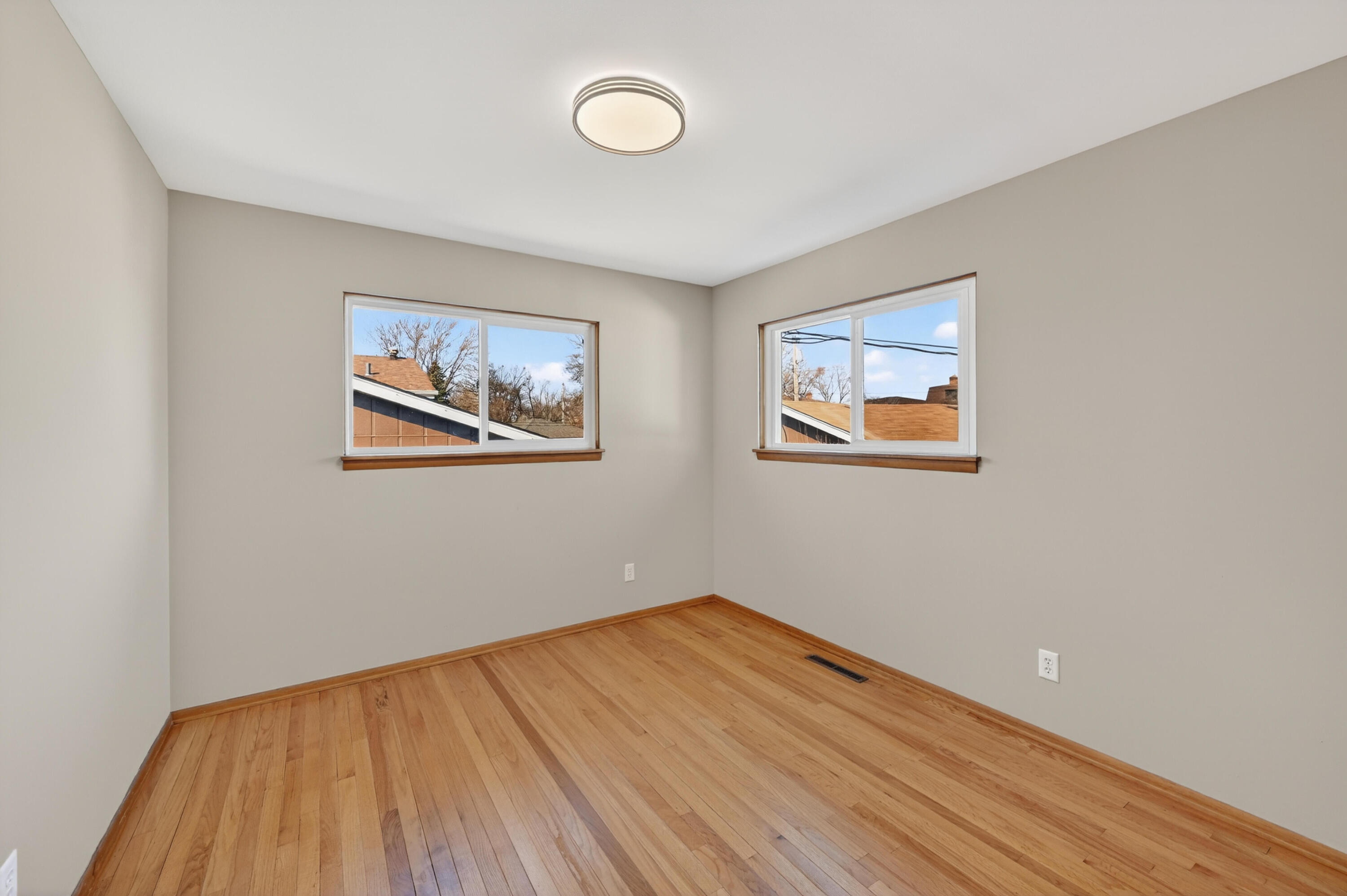 1006 West Ash Street Griffith, IN 46319 - Photo 18 of 25 a view of empty room with wooden floor