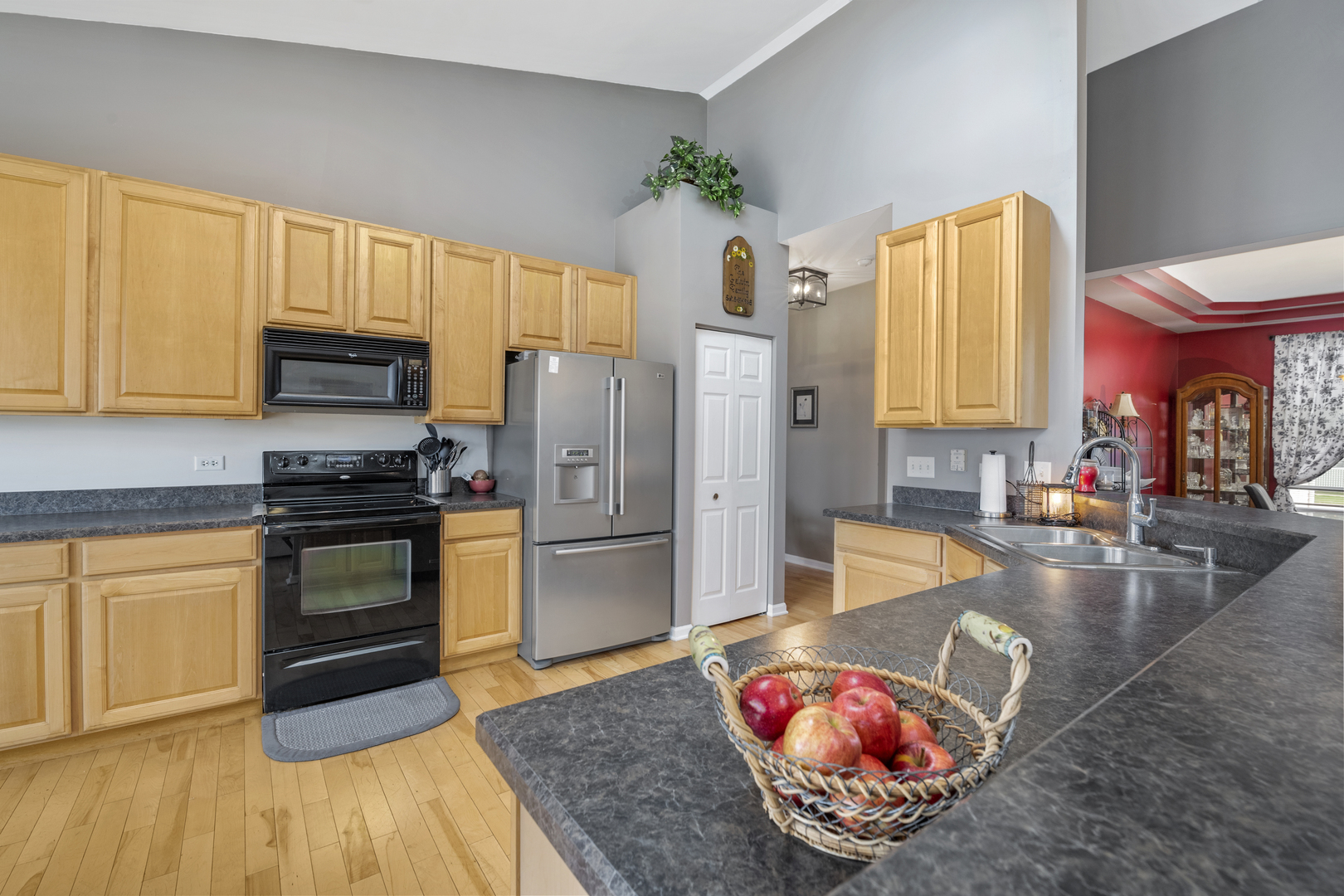 25420 Spring Street Manhattan, IL 60442 - Photo 11 of 27 a kitchen with stainless steel appliances granite countertop a refrigerator stove top oven a sink and dishwasher
