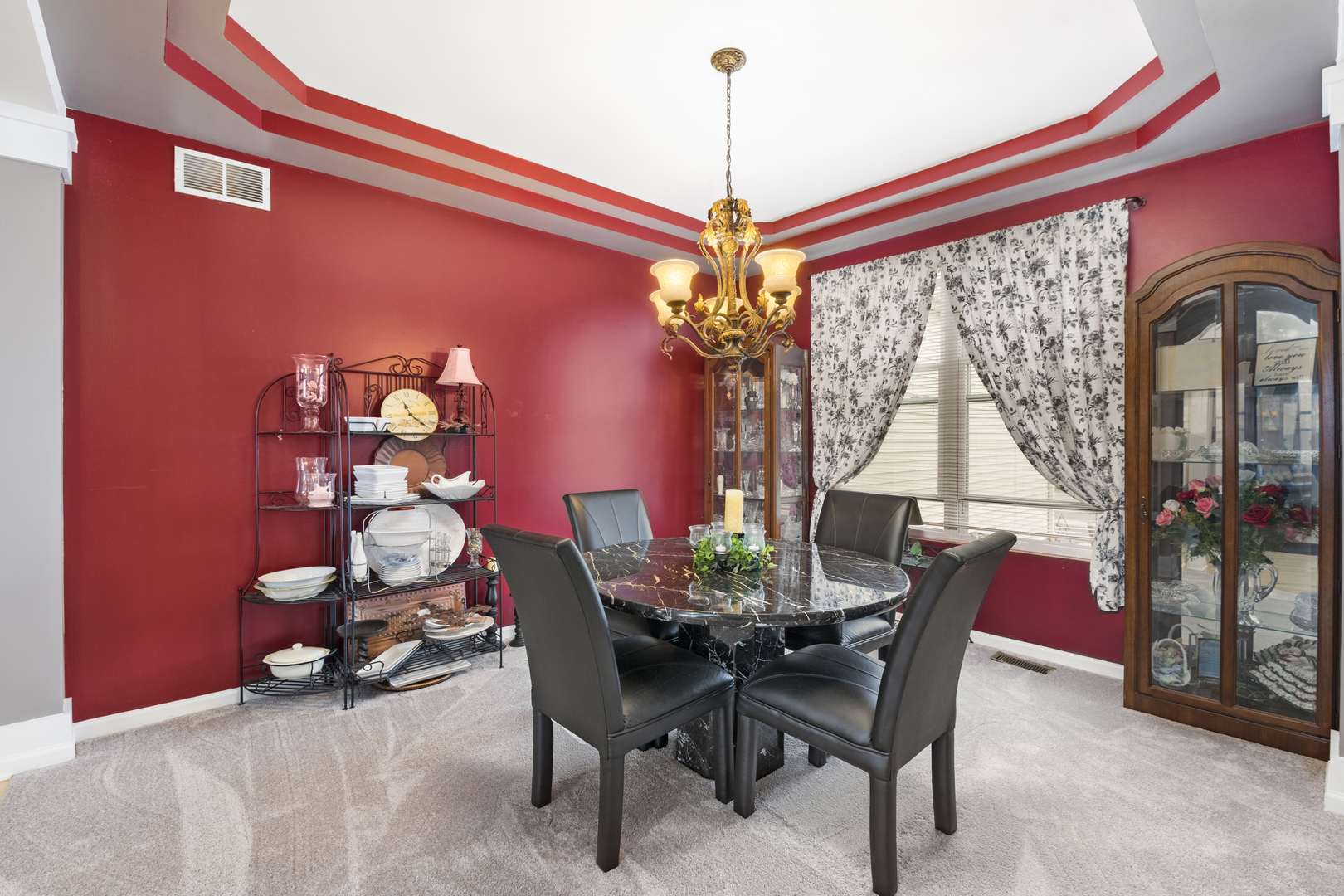 25420 Spring Street Manhattan, IL 60442 - Photo 14 of 27 a view of a dining room with furniture and chandelier