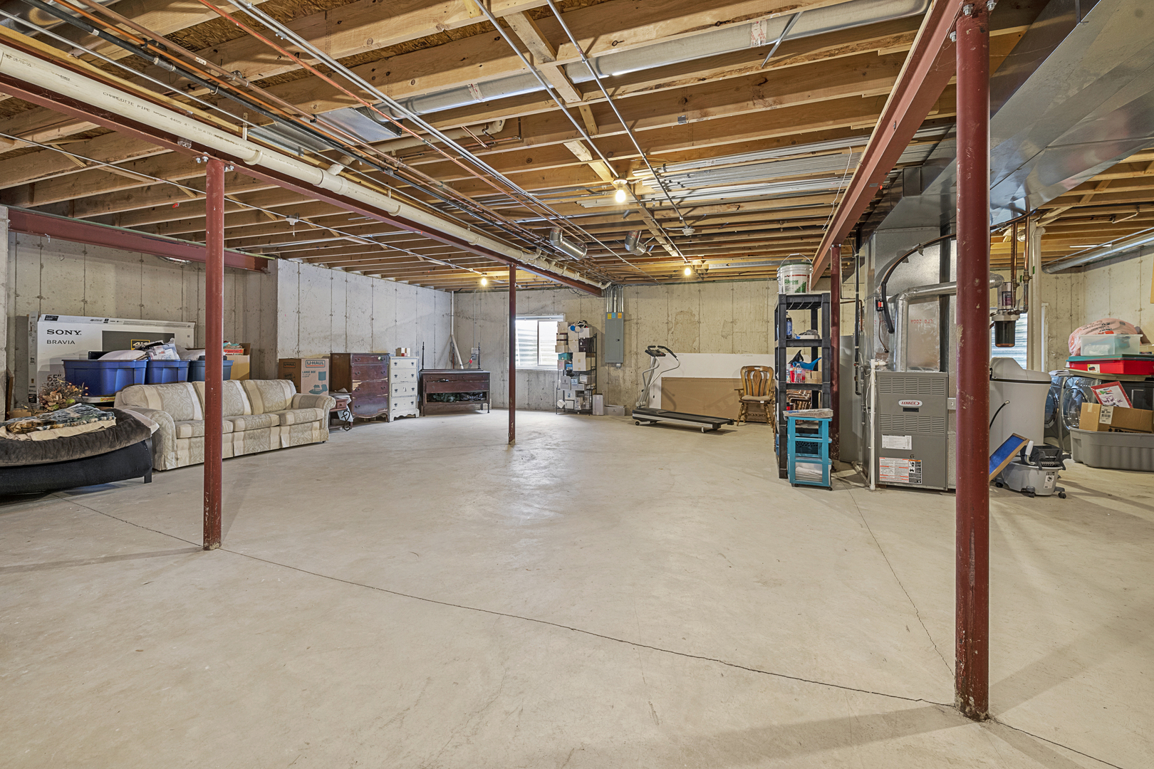 25420 Spring Street Manhattan, IL 60442 - Photo 23 of 27 a view of parking garage with furniture