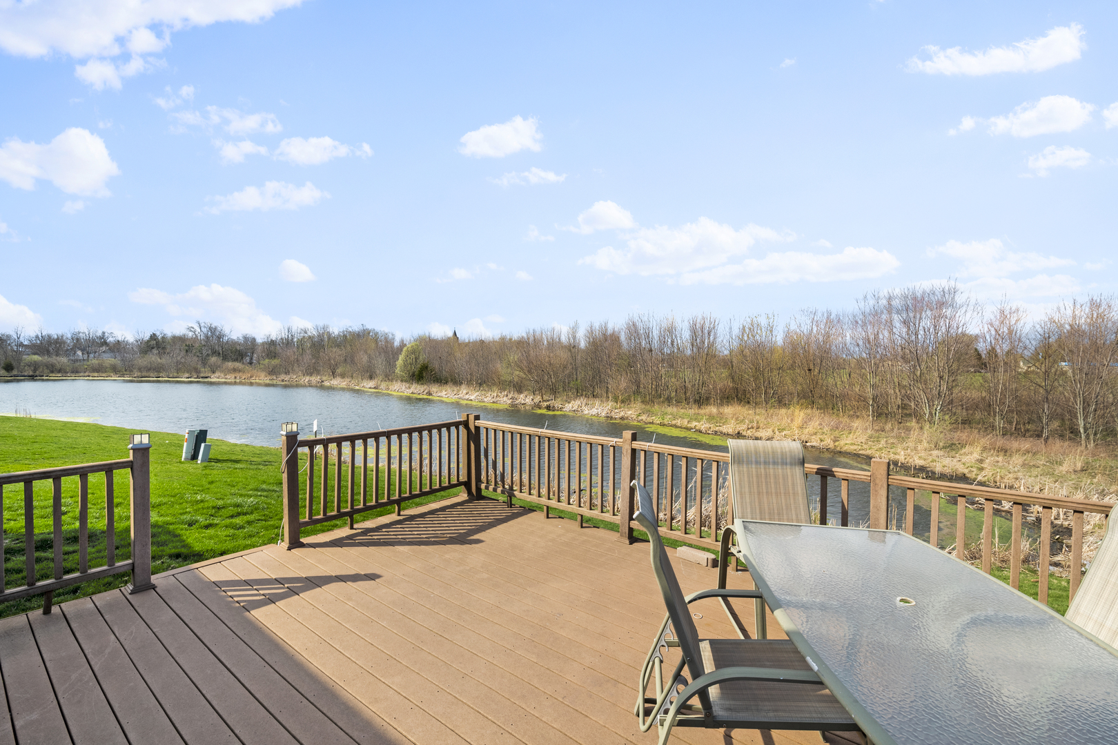 25420 Spring Street Manhattan, IL 60442 - Photo 26 of 27 a view of a terrace with wooden floor and lake view