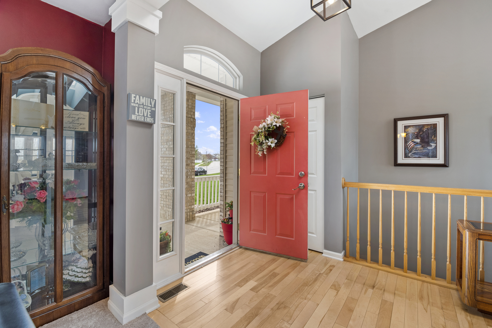 25420 Spring Street Manhattan, IL 60442 - Photo 5 of 27 a view of an entryway with wooden floor