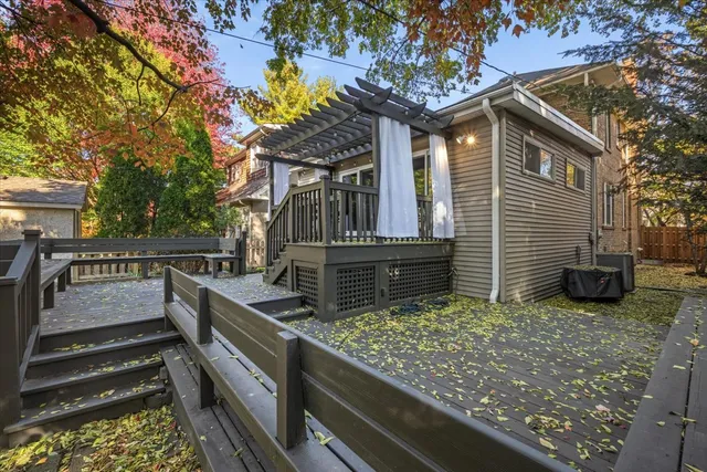 a view of house with backyard