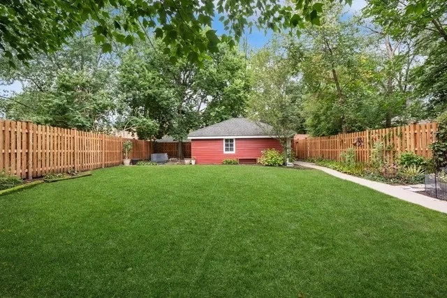 a view of a backyard with a garden