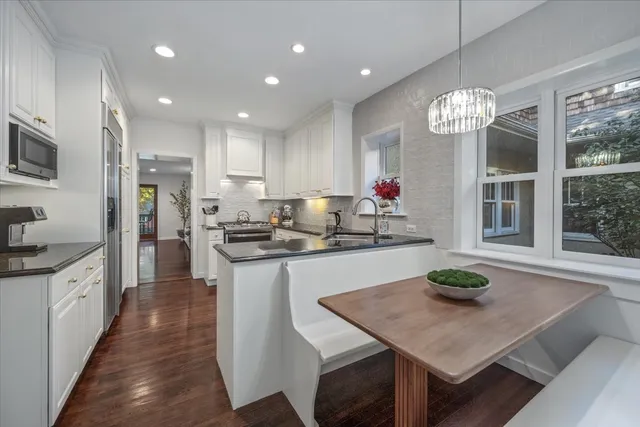 a kitchen with counter space cabinets and appliances