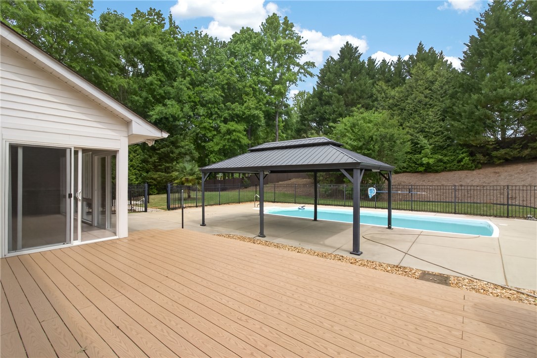 106 Newington Circle Anderson, SC 29621 - Photo 14 of 27 This spacious deck and pool area offers a private oasis for outdoor enjoyment.