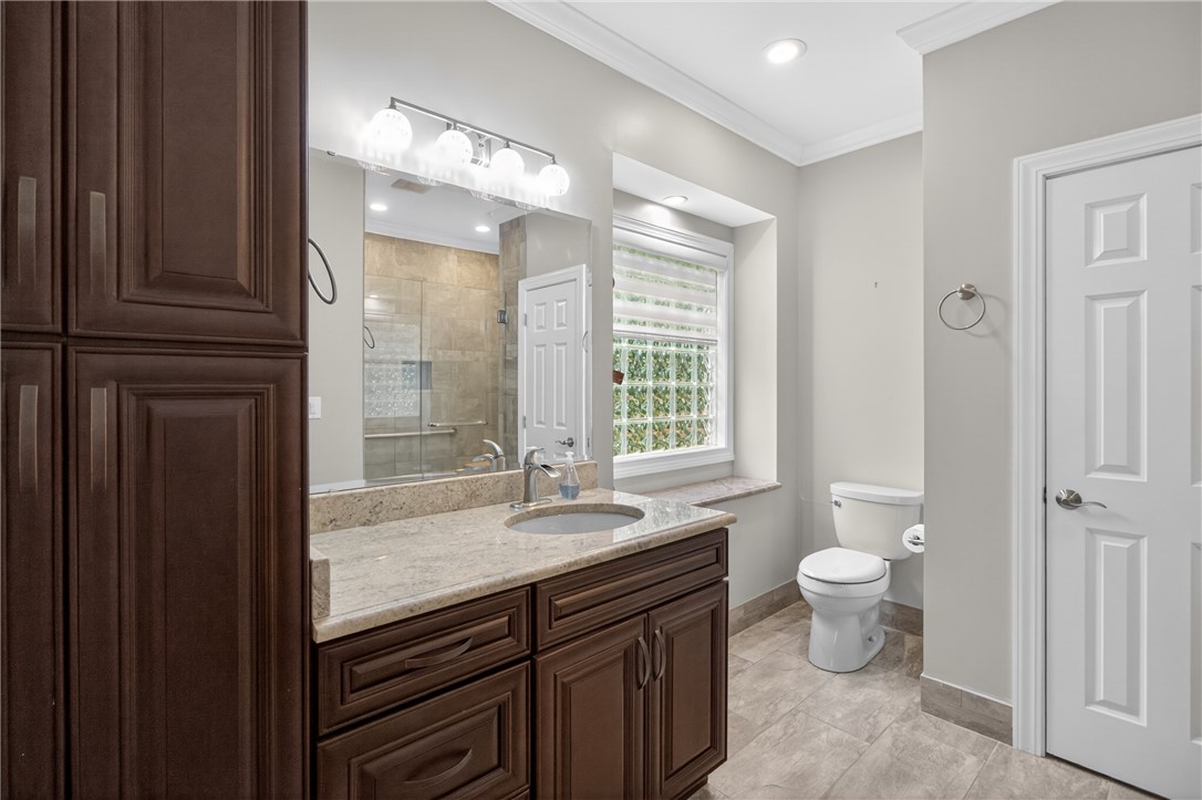 106 Newington Circle Anderson, SC 29621 - Photo 19 of 27 This primary bathroom features a shower, a sleek vanity, and modern fixtures, creating a tranquil retreat.