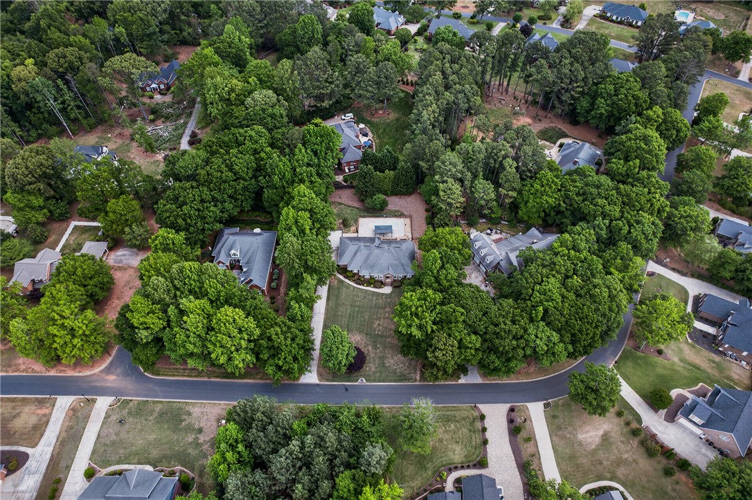 106 Newington Circle Anderson, SC 29621 - Photo 25 of 27 An aerial perspective reveals a tranquil residential community with lush greenery and winding streets.