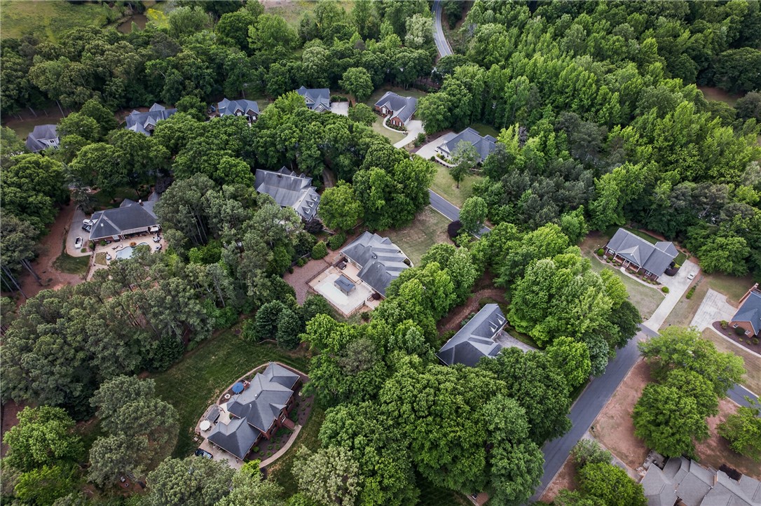106 Newington Circle Anderson, SC 29621 - Photo 27 of 27 An aerial view showcases a vibrant community nestled within lush, mature greenery.