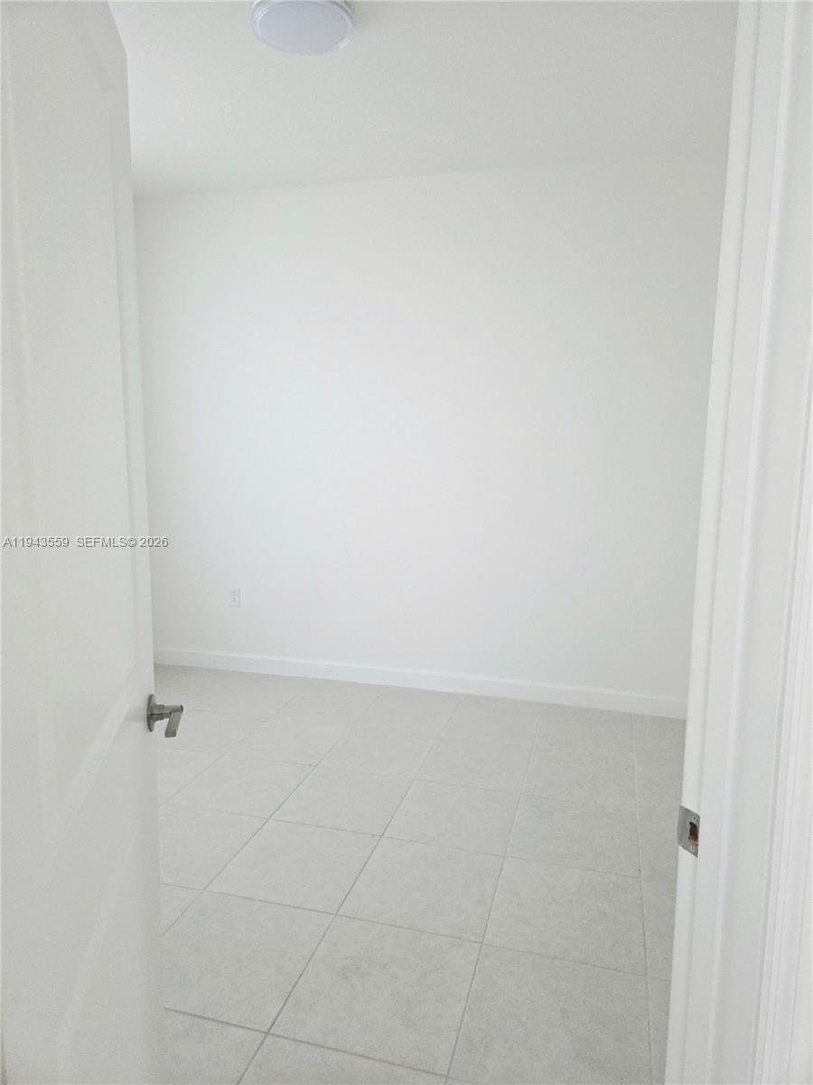 17925 Southwest 358th Street Homestead, FL 33034 - Photo 11 of 25 a view of an empty room